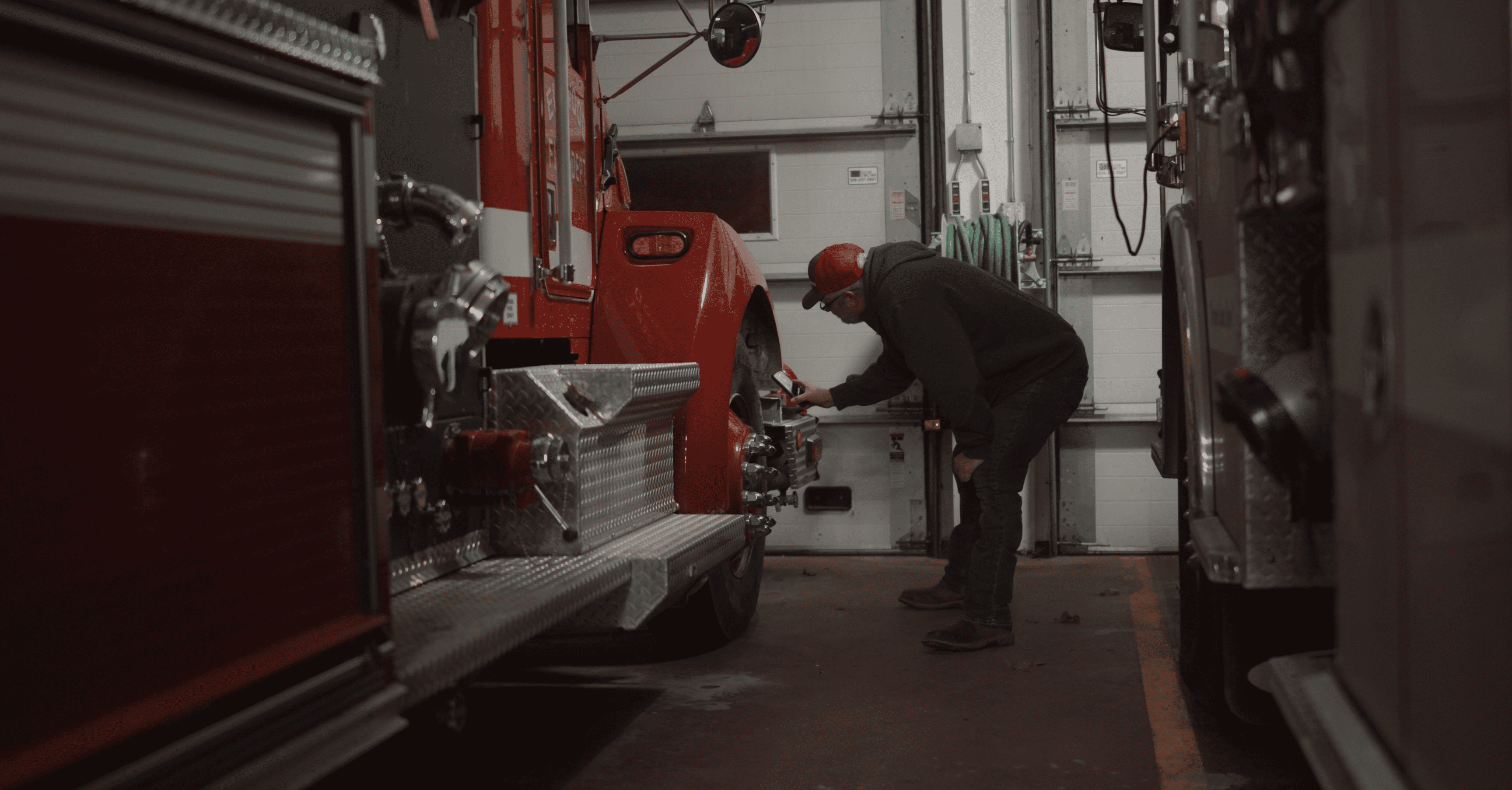Man inspecting truck